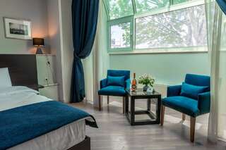 Отель Hotel Bella Casa Тбилиси Улучшенный семейный номер-1